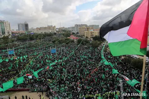 Palestinian Hamas supporters attend a rally marking the 30th anniversary of the founding of the Hamas movement, in Gaza city, December 14, 2017. Photo by Mohammed Dahman