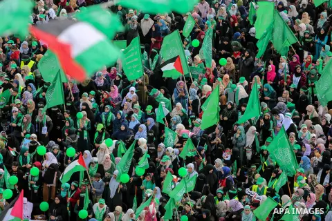 Palestinian Hamas supporters attend a rally marking the 30th anniversary of the founding of the Hamas movement, in Gaza city, December 14, 2017. Photo by Mohammed Dahman