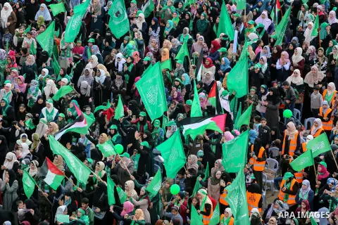 Palestinian Hamas supporters attend a rally marking the 30th anniversary of the founding of the Hamas movement, in Gaza city, December 14, 2017. Photo by Mohammed Dahman