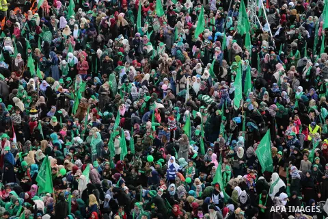 Palestinian Hamas supporters attend a rally marking the 30th anniversary of the founding of the Hamas movement, in Gaza city, December 14, 2017. Photo by Mohammed Dahman