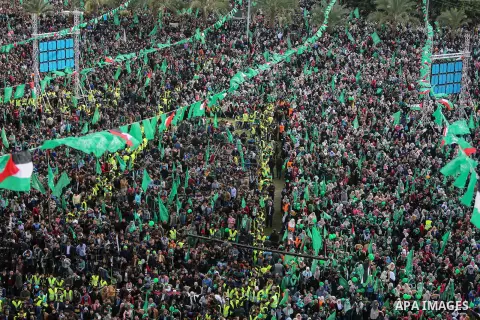 Palestinian Hamas supporters attend a rally marking the 30th anniversary of the founding of the Hamas movement, in Gaza city, December 14, 2017. Photo by Mohammed Dahman