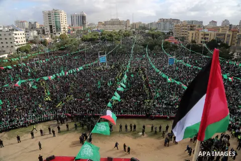 Palestinian Hamas supporters attend a rally marking the 30th anniversary of the founding of the Hamas movement, in Gaza city, December 14, 2017. Photo by Mohammed Dahman