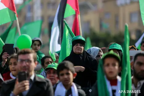 Palestinian Hamas supporters attend a rally marking the 30th anniversary of the founding of the Hamas movement, in Gaza city, December 14, 2017. Photo by Mohammed Dahman