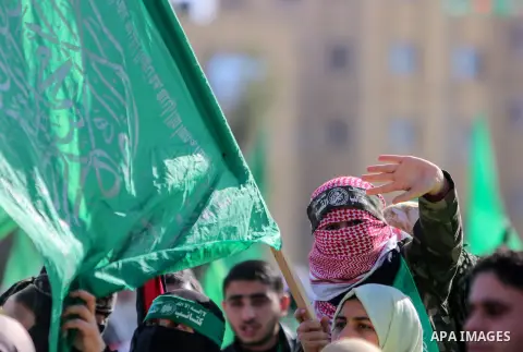 Palestinian Hamas supporters attend a rally marking the 30th anniversary of the founding of the Hamas movement, in Gaza city, December 14, 2017. Photo by Mohammed Dahman