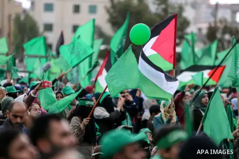 Palestinian Hamas supporters attend a rally marking the 30th anniversary of the founding of the Hamas movement, in Gaza city, December 14, 2017. Photo by Mohammed Dahman