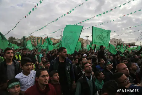 Palestinian Hamas supporters attend a rally marking the 30th anniversary of the founding of the Hamas movement, in Gaza city, December 14, 2017. Photo by Mohammed Dahman