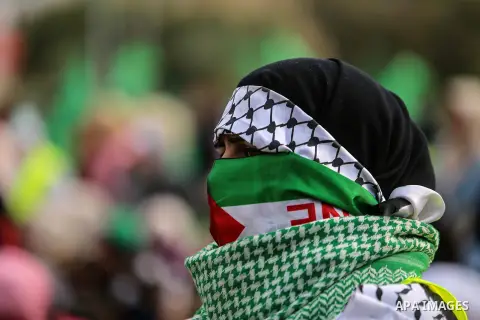 Palestinian Hamas supporters attend a rally marking the 30th anniversary of the founding of the Hamas movement, in Gaza city, December 14, 2017. Photo by Mohammed Dahman