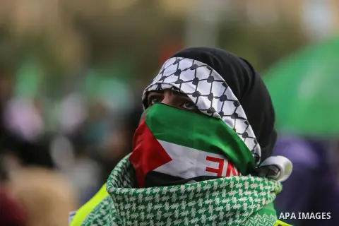 Palestinian Hamas supporters attend a rally marking the 30th anniversary of the founding of the Hamas movement, in Gaza city, December 14, 2017. Photo by Mohammed Dahman