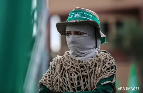 Palestinian Hamas supporters attend a rally marking the 30th anniversary of the founding of the Hamas movement, in Gaza city, December 14, 2017. Photo by Mohammed Dahman