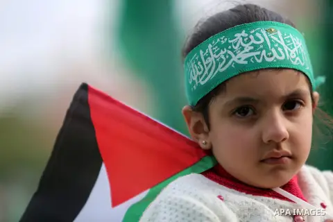 Palestinian Hamas supporters attend a rally marking the 30th anniversary of the founding of the Hamas movement, in Gaza city, December 14, 2017. Photo by Mohammed Dahman