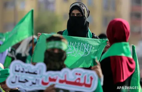Palestinian Hamas supporters attend a rally marking the 30th anniversary of the founding of the Hamas movement, in Gaza city, December 14, 2017. Photo by Mohammed Dahman
