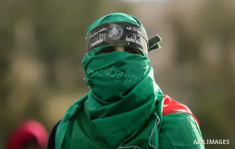 Palestinian Hamas supporters attend a rally marking the 30th anniversary of the founding of the Hamas movement, in Gaza city, December 14, 2017. Photo by Mohammed Dahman