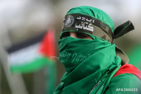 Palestinian Hamas supporters attend a rally marking the 30th anniversary of the founding of the Hamas movement, in Gaza city, December 14, 2017. Photo by Mohammed Dahman