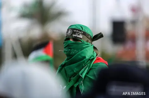Palestinian Hamas supporters attend a rally marking the 30th anniversary of the founding of the Hamas movement, in Gaza city, December 14, 2017. Photo by Mohammed Dahman