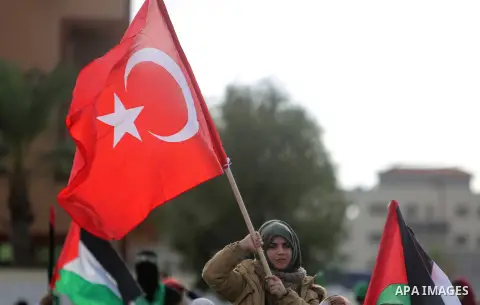 Palestinian Hamas supporters attend a rally marking the 30th anniversary of the founding of the Hamas movement, in Gaza city, December 14, 2017. Photo by Mohammed Dahman