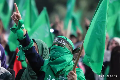 Palestinian Hamas supporters attend a rally marking the 30th anniversary of the founding of the Hamas movement, in Gaza city, December 14, 2017. Photo by Mohammed Dahman