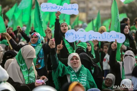 Palestinian Hamas supporters attend a rally marking the 30th anniversary of the founding of the Hamas movement, in Gaza city, December 14, 2017. Photo by Mohammed Dahman