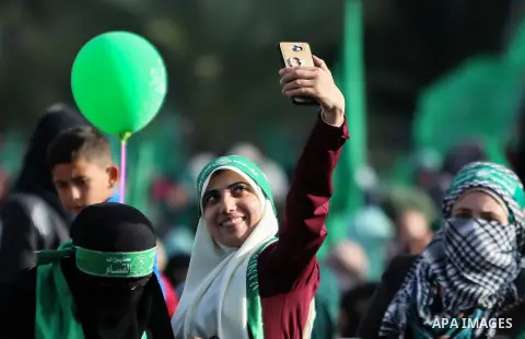 Palestinian Hamas supporters attend a rally marking the 30th anniversary of the founding of the Hamas movement, in Gaza city, December 14, 2017. Photo by Mohammed Dahman