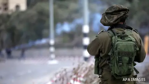 Palestinian protestors, from the nearby Palestinian village of Naqura, confront Israeli security forces close to the Jewish settlement of Shavei Shomron near the West Bank city of Tulkarem on December 14, 2017, as protes...
