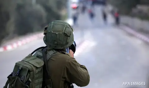 Palestinian protestors, from the nearby Palestinian village of Naqura, confront Israeli security forces close to the Jewish settlement of Shavei Shomron near the West Bank city of Tulkarem on December 14, 2017, as protes...