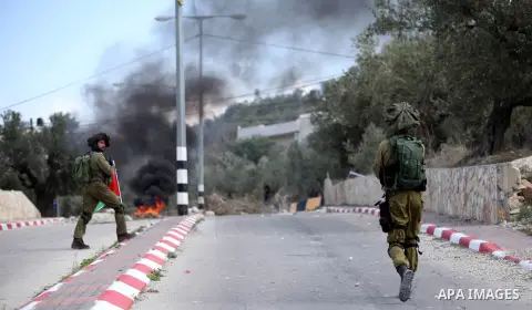 Palestinian protestors, from the nearby Palestinian village of Naqura, confront Israeli security forces close to the Jewish settlement of Shavei Shomron near the West Bank city of Tulkarem on December 14, 2017, as protes...