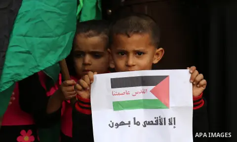 Palestinians take part in a protest against US President Donald Trump's decision to recognise Jerusalem as the capital of Israel, in Khan youis in the southen of Gaza strip, on December 15, 2017. Thousands of Palestinian...