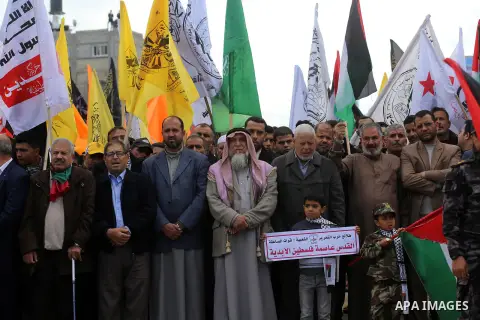Palestinians take part in a protest against US President Donald Trump's decision to recognise Jerusalem as the capital of Israel, in Khan youis in the southen of Gaza strip, on December 15, 2017. Thousands of Palestinian...