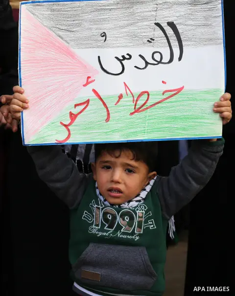 Palestinians take part in a protest against US President Donald Trump's decision to recognise Jerusalem as the capital of Israel, in Khan youis in the southen of Gaza strip, on December 15, 2017. Thousands of Palestinian...