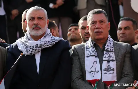 Hamas Chief Ismail Haniyeh takes part during a protest against US President Donald Trump's decision to recognise Jerusalem as the capital of Israel, in Gaza city, on December 15, 2017. Thousands of Palestinians protested...