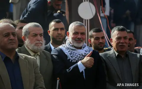 Hamas Chief Ismail Haniyeh takes part during a protest against US President Donald Trump's decision to recognise Jerusalem as the capital of Israel, in Gaza city, on December 15, 2017. Thousands of Palestinians protested...