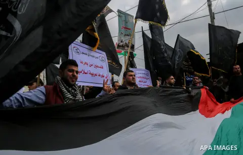 Palestinians take part during a protest against US President Donald Trump's decision to recognise Jerusalem as the capital of Israel, in Gaza city, on December 15, 2017. Thousands of Palestinians protested again in Jerus...