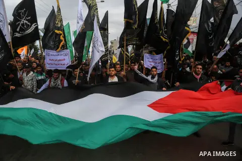Palestinians take part during a protest against US President Donald Trump's decision to recognise Jerusalem as the capital of Israel, in Gaza city, on December 15, 2017. Thousands of Palestinians protested again in Jerus...