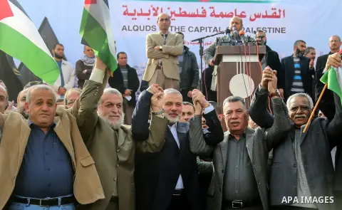 Hamas Chief Ismail Haniyeh takes part during a protest against US President Donald Trump's decision to recognise Jerusalem as the capital of Israel, in Gaza city, on December 15, 2017. Thousands of Palestinians protested...