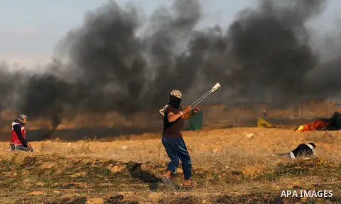 Palestinian protesters clash with Israeli forces, in Khan Younis in the southern Gaza Strip, on December 15, 2017. Thousands of Palestinians protested again in Jerusalem against US President Donald Trump's decision to re...