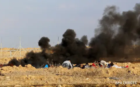 Palestinian protesters clash with Israeli forces, in Khan Younis in the southern Gaza Strip, on December 15, 2017. Thousands of Palestinians protested again in Jerusalem against US President Donald Trump's decision to re...