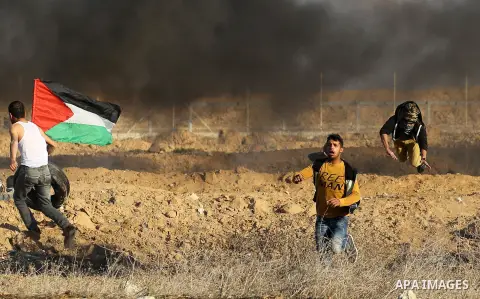 Palestinian protesters clash with Israeli forces, in Khan Younis in the southern Gaza Strip, on December 15, 2017. Thousands of Palestinians protested again in Jerusalem against US President Donald Trump's decision to re...