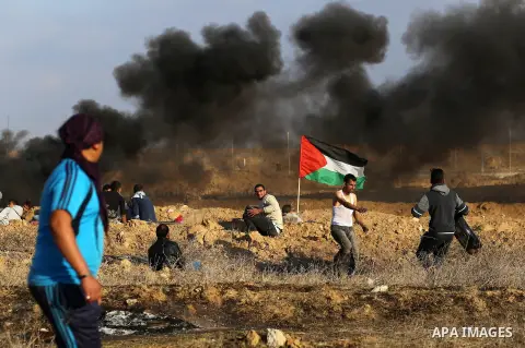 Palestinian protesters clash with Israeli forces, in Khan Younis in the southern Gaza Strip, on December 15, 2017. Thousands of Palestinians protested again in Jerusalem against US President Donald Trump's decision to re...