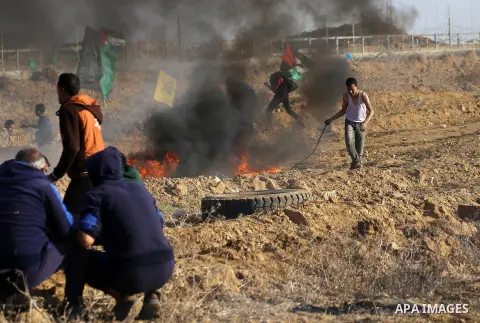 Palestinian protesters clash with Israeli forces, in Khan Younis in the southern Gaza Strip, on December 15, 2017. Thousands of Palestinians protested again in Jerusalem against US President Donald Trump's decision to re...