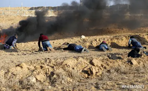 Palestinian protesters clash with Israeli forces, in Khan Younis in the southern Gaza Strip, on December 15, 2017. Thousands of Palestinians protested again in Jerusalem against US President Donald Trump's decision to re...