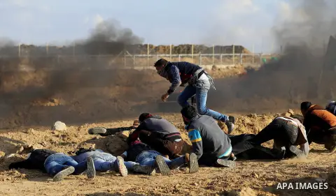 Palestinian protesters clash with Israeli forces, in Khan Younis in the southern Gaza Strip, on December 15, 2017. Thousands of Palestinians protested again in Jerusalem against US President Donald Trump's decision to re...