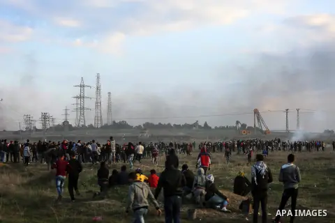 Palestinian protesters clash with Israeli security forces near the border fence with Israel, east of Gaza City on December 15, 2017 as demonstrations continue over US President Donald Trump's declaration of Jerusalem as...
