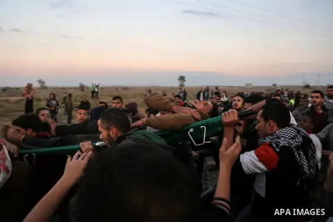 Palestinian protesters clash with Israeli security forces near the border fence with Israel, east of Gaza City on December 15, 2017 as demonstrations continue over US President Donald Trump's declaration of Jerusalem as...