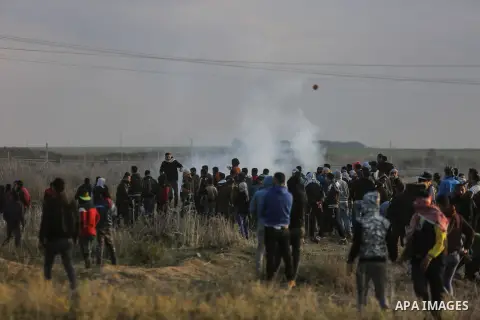Palestinian protesters clash with Israeli security forces near the border fence with Israel, east of Gaza City on December 15, 2017 as demonstrations continue over US President Donald Trump's declaration of Jerusalem as...