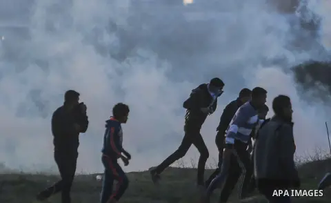 Palestinian protesters clash with Israeli security forces near the border fence with Israel, east of Gaza City on December 15, 2017 as demonstrations continue over US President Donald Trump's declaration of Jerusalem as...