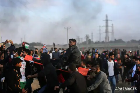 Palestinian protesters clash with Israeli security forces near the border fence with Israel, east of Gaza City on December 15, 2017 as demonstrations continue over US President Donald Trump's declaration of Jerusalem as...