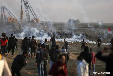 Palestinian protesters clash with Israeli security forces near the border fence with Israel, east of Gaza City on December 15, 2017 as demonstrations continue over US President Donald Trump's declaration of Jerusalem as...