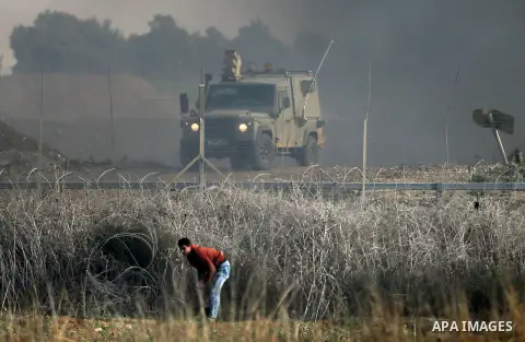 Palestinian protesters clash with Israeli security forces near the border fence with Israel, east of Gaza City on December 15, 2017 as demonstrations continue over US President Donald Trump's declaration of Jerusalem as...