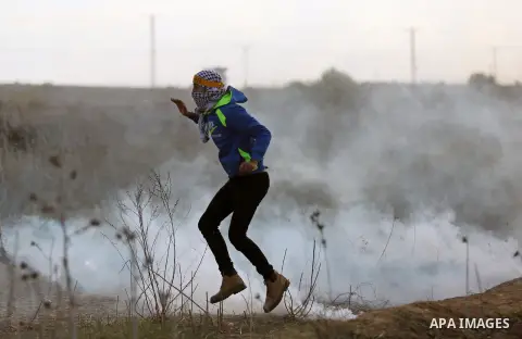 Palestinian protesters clash with Israeli security forces near the border fence with Israel, east of Gaza City on December 15, 2017 as demonstrations continue over US President Donald Trump's declaration of Jerusalem as...