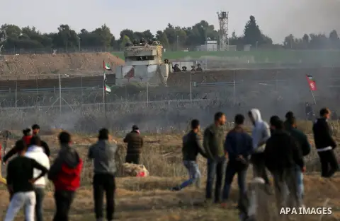 Palestinian protesters clash with Israeli security forces near the border fence with Israel, east of Gaza City on December 15, 2017 as demonstrations continue over US President Donald Trump's declaration of Jerusalem as...