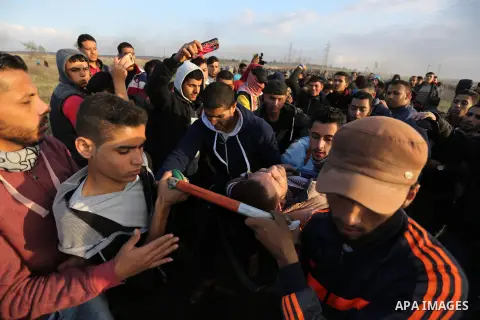Palestinian protesters clash with Israeli security forces near the border fence with Israel, east of Gaza City on December 15, 2017 as demonstrations continue over US President Donald Trump's declaration of Jerusalem as...